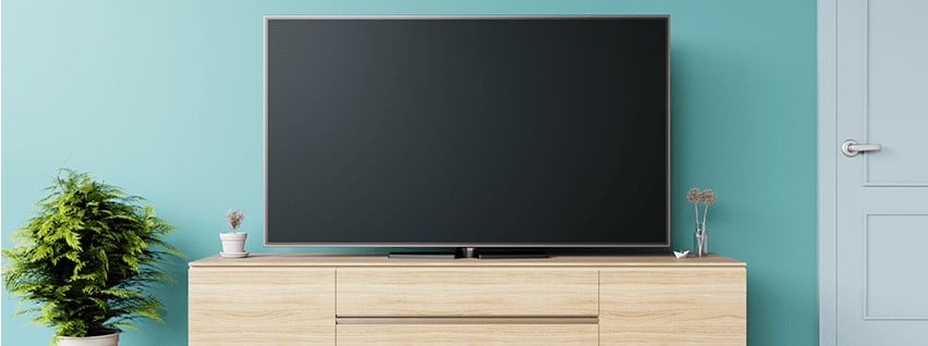meuble bas pour grande tv avec mur bleu